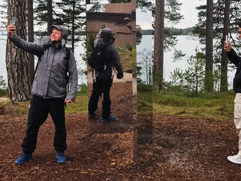 Kaksi ihmistä seisoo rannalla ja ottaa kuvia kännykällä.